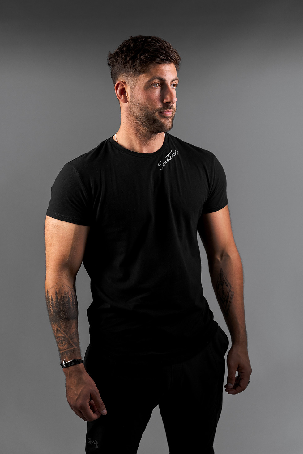 Detail shot of black t-shirt fabric showing smooth finish and durability