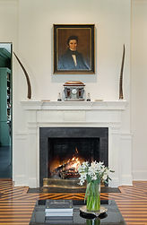 Living room fireplace beneath an ancestral portrait, Litchfield CT