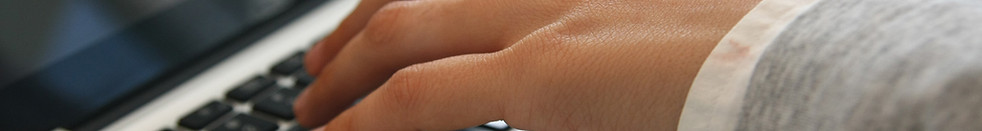 Hand on Laptop