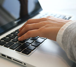 Hand on Laptop