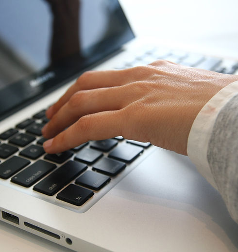 Hand on Laptop