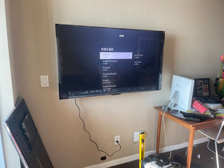 65" TV mounted into Drywall in a Toronto Condo
