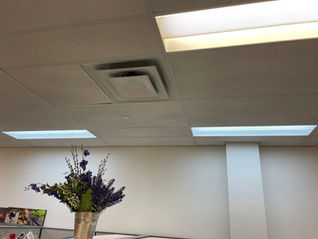 For this Toronto commercial service request, several overhead lights within the drop ceiling had stopped working, leaving portions of the space noticeably darker.