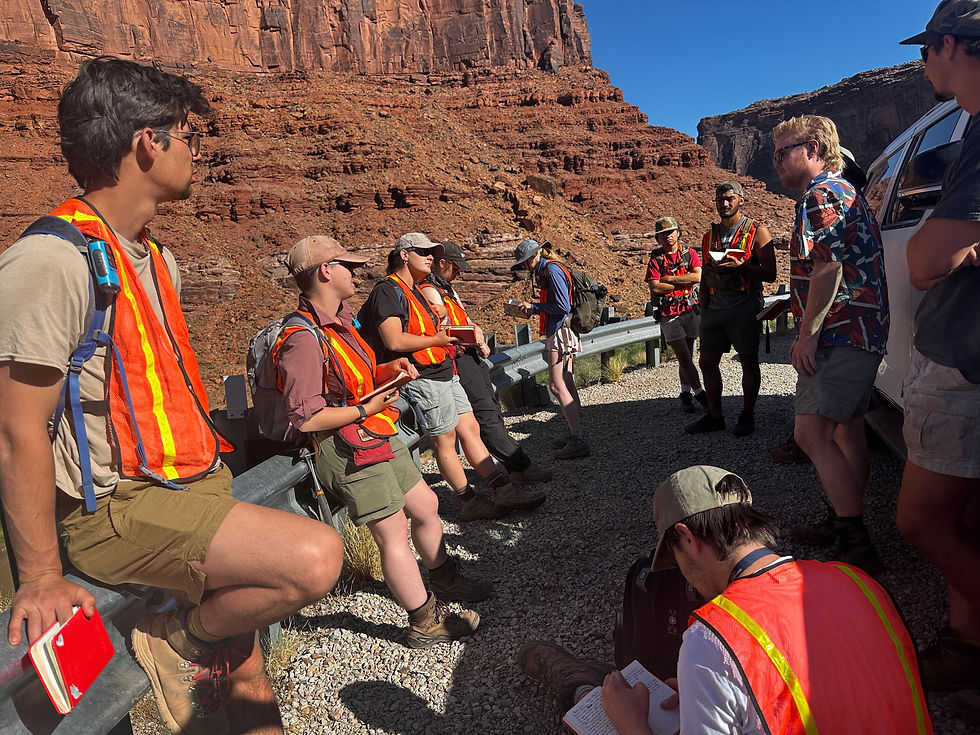 USC geological sciences MS student JD Ross discusses the interplay between extreme climate events, salt deformation and synkinematic sedimentation with USC Geology Field Camp students along the Colorado River, Utah.