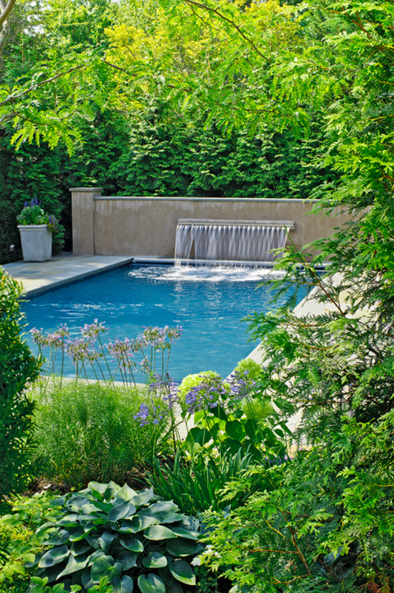 The pool tucked back on the property makes it a true destination.