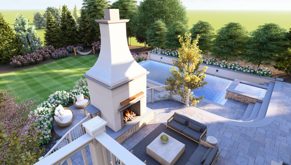 View from the upper level deck of the fireplace, patio and the pool beyond.