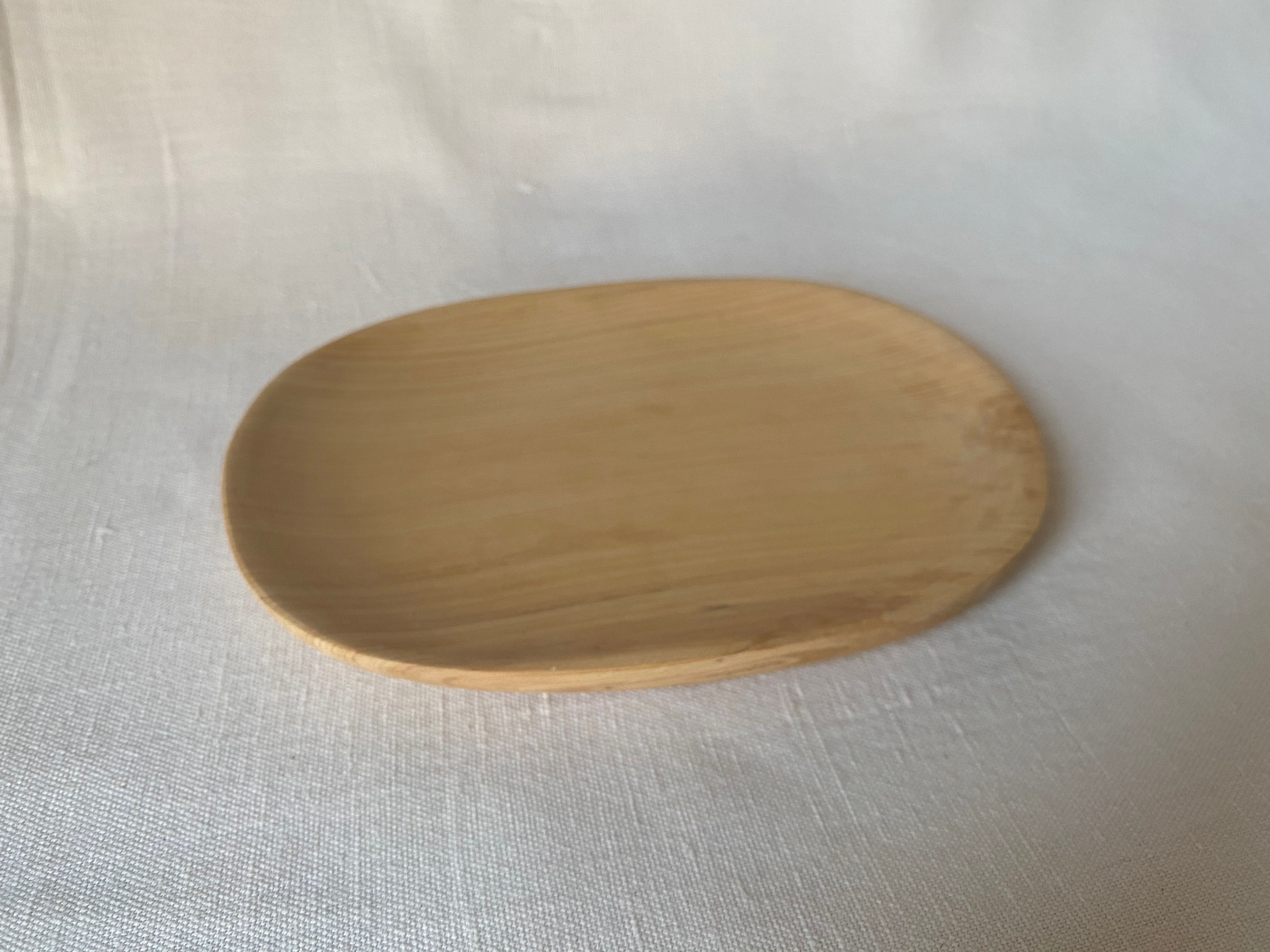 Small handcrafted plate in cedar wood