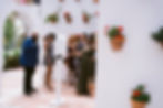 People gather around a Digital Photo Booth Rental.