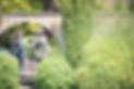 Estate Agent Becky with a client photographing a garden of a property for sale