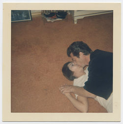 fp2705(Couple_Kissing_OnFloor)