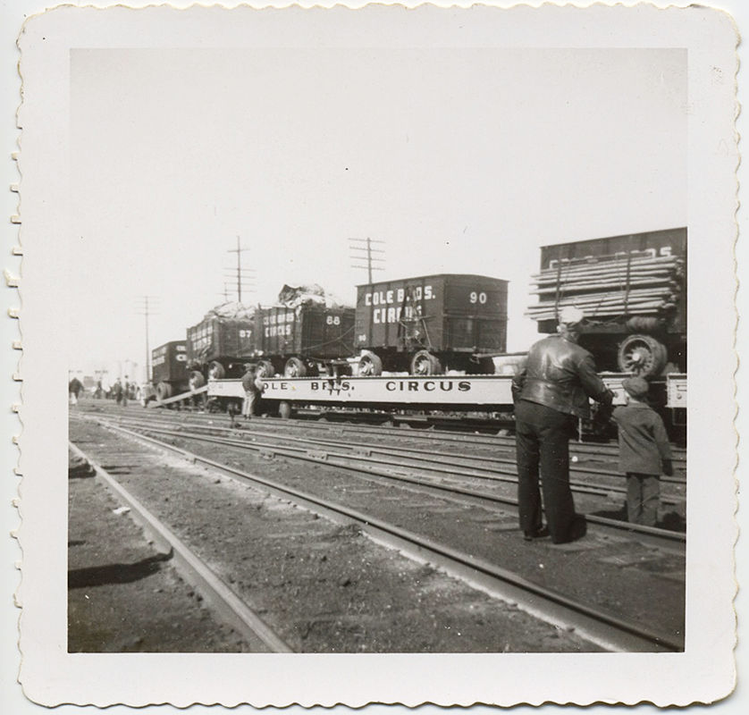 Thumbnail: COLE BROS CIRCUS TRAIN WORKERS WATCH ROLLING STOCK w WAGONS ROLL BY! 3 pics