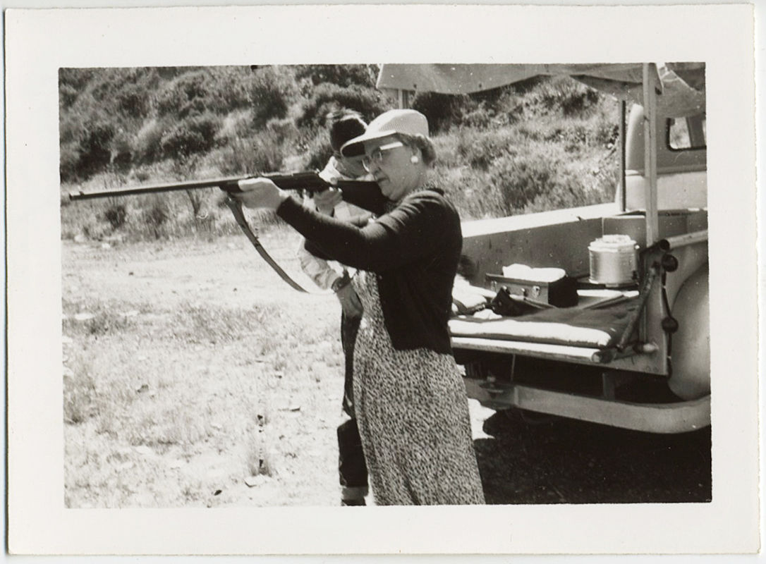 ANNIE GETS HER GUN! OLDER WOMAN MARKSMAN AIMS RIFLE SHOTGUN at UNSEEN TARGET