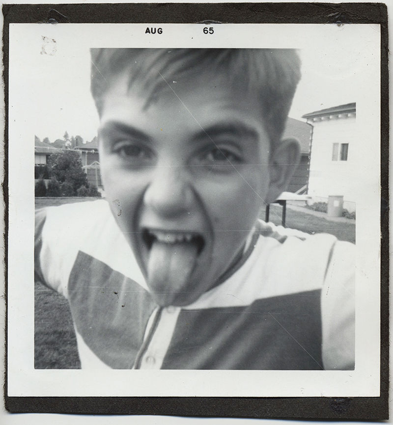 FABULOUS BOY STICKS OUT TONGUE at CAMERA CLOSE UP