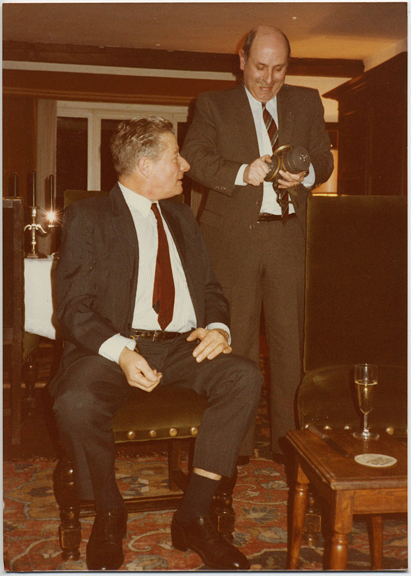TWO MEN EXAMINE GAS MASK in DOMESTIC INTERIOR WEIRD!