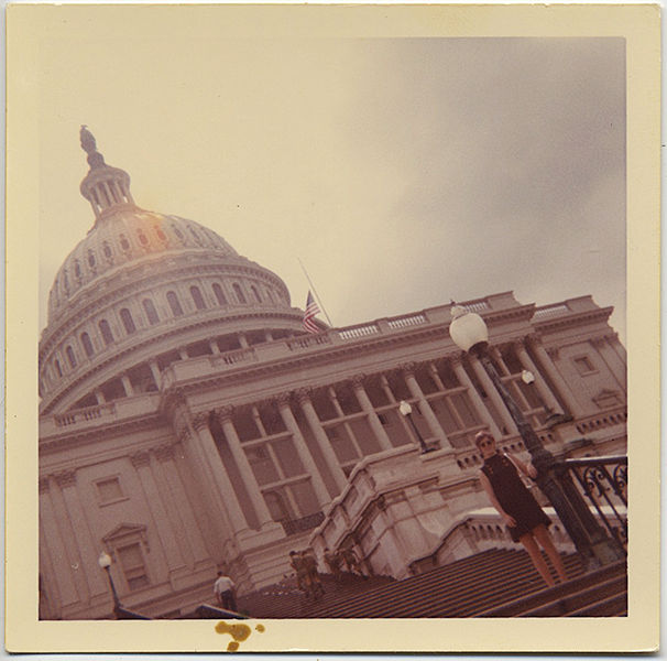 WOMAN POSES on US CAPITOL STEPS OFF KILTER FRAMING almost DUTCH ANGLE