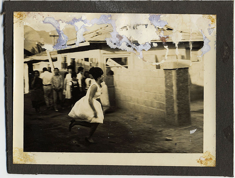 DISTRESSED WATER-DAMAGED IMAGE SEXY WOMAN RUNS FOR COVER while CROWD WATCHES!