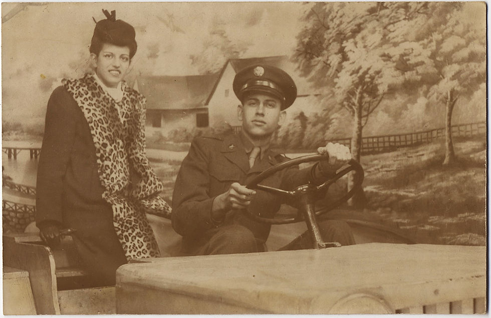 Thumbnail: NY CITY ARCADE IMAGE SERVICEMAN & GIRLFIREND in JEEP w PAINTED BACKDROP RPPC
