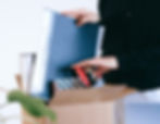 an autistic woman fixing her things in an office setup