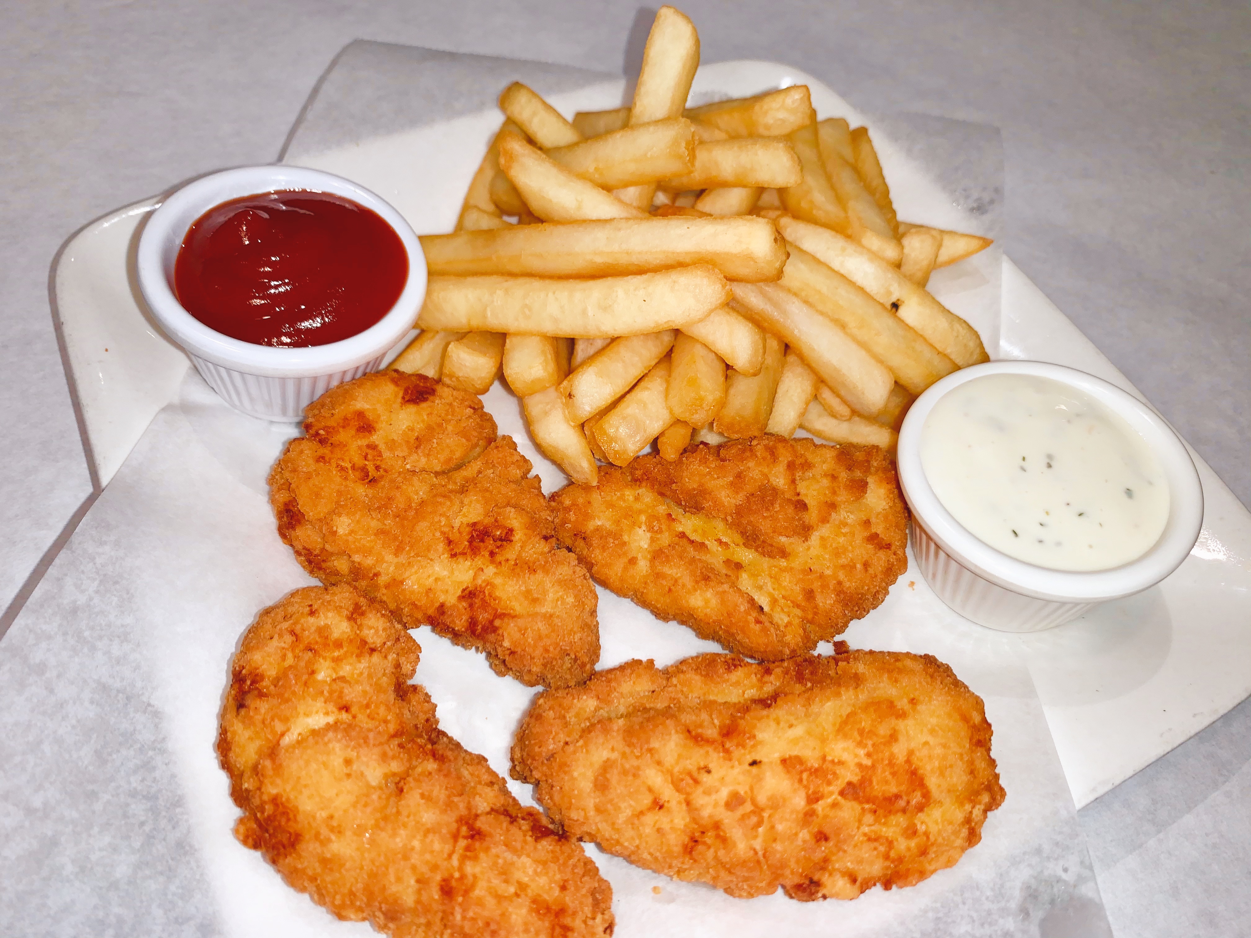 Chicken Strips w/ Cajun Fries