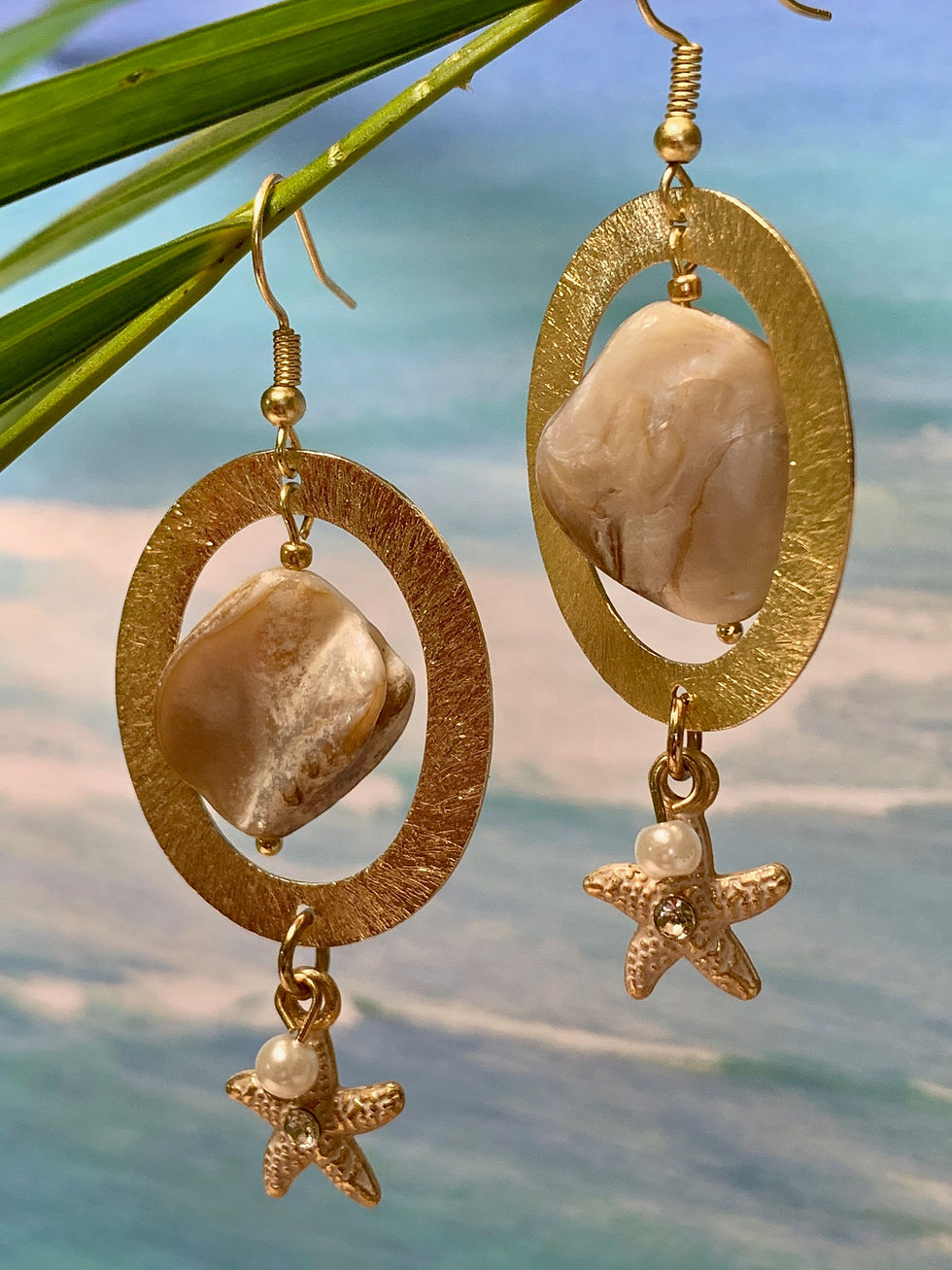 Thumbnail: Brown Lip Shell Oval Golden E-coated Earrings