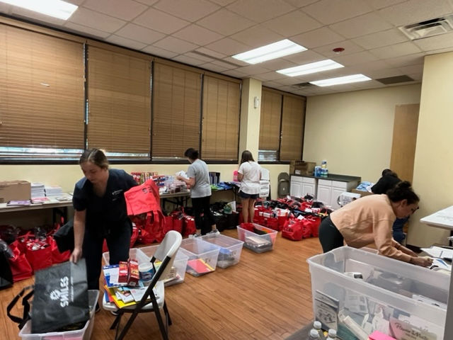 SMILES provides school supplies for Miles Perret families