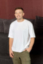 Male individual representing the owner of Tableside Creatives agency, depicted in a poised portrait