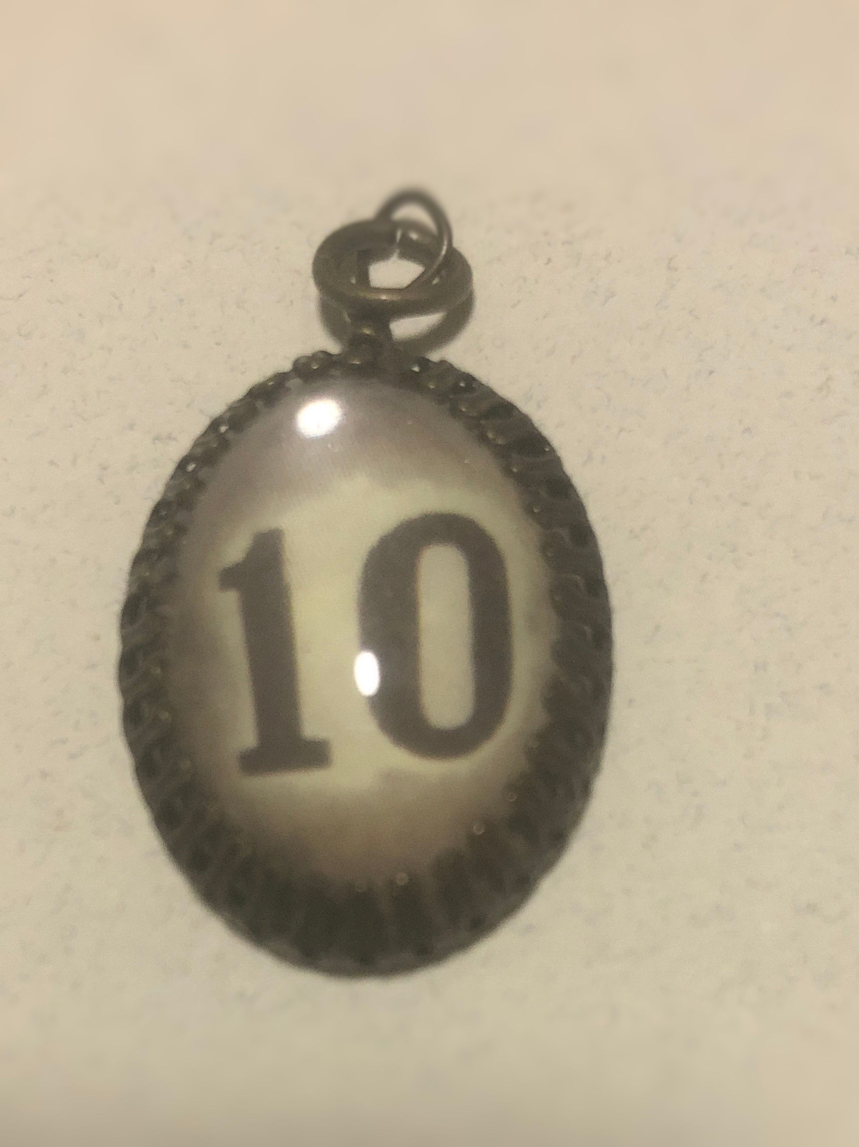 Glass “10” Charm FREE With Purchase 