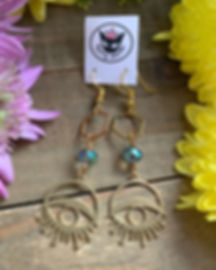 Evil eye sunburst earrings