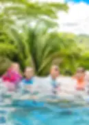 Family enjoying pool in Family villa at luxury Belize Eco-lodge Copal Tree Lodge  (1).webp