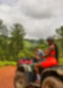 Woman riding a jungle ATV at luxury Belize Eco-lodge Copal Tree Lodge.webp