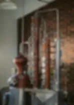 Distilling machine in distillery on luxury Belize Eco-lodge Copal Tree Lodge.webp