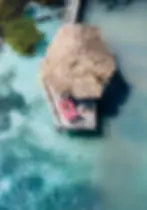 Thatch Caye overwater bungalow luxury private island.webp