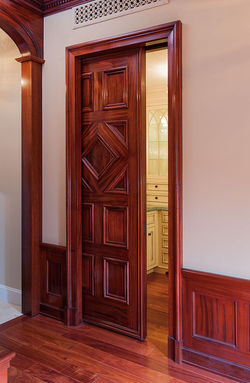 A pocket door made from premium wood.