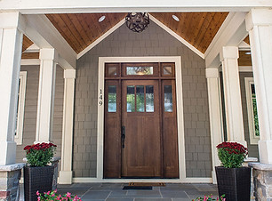 A strong and properly installed wooden front door.