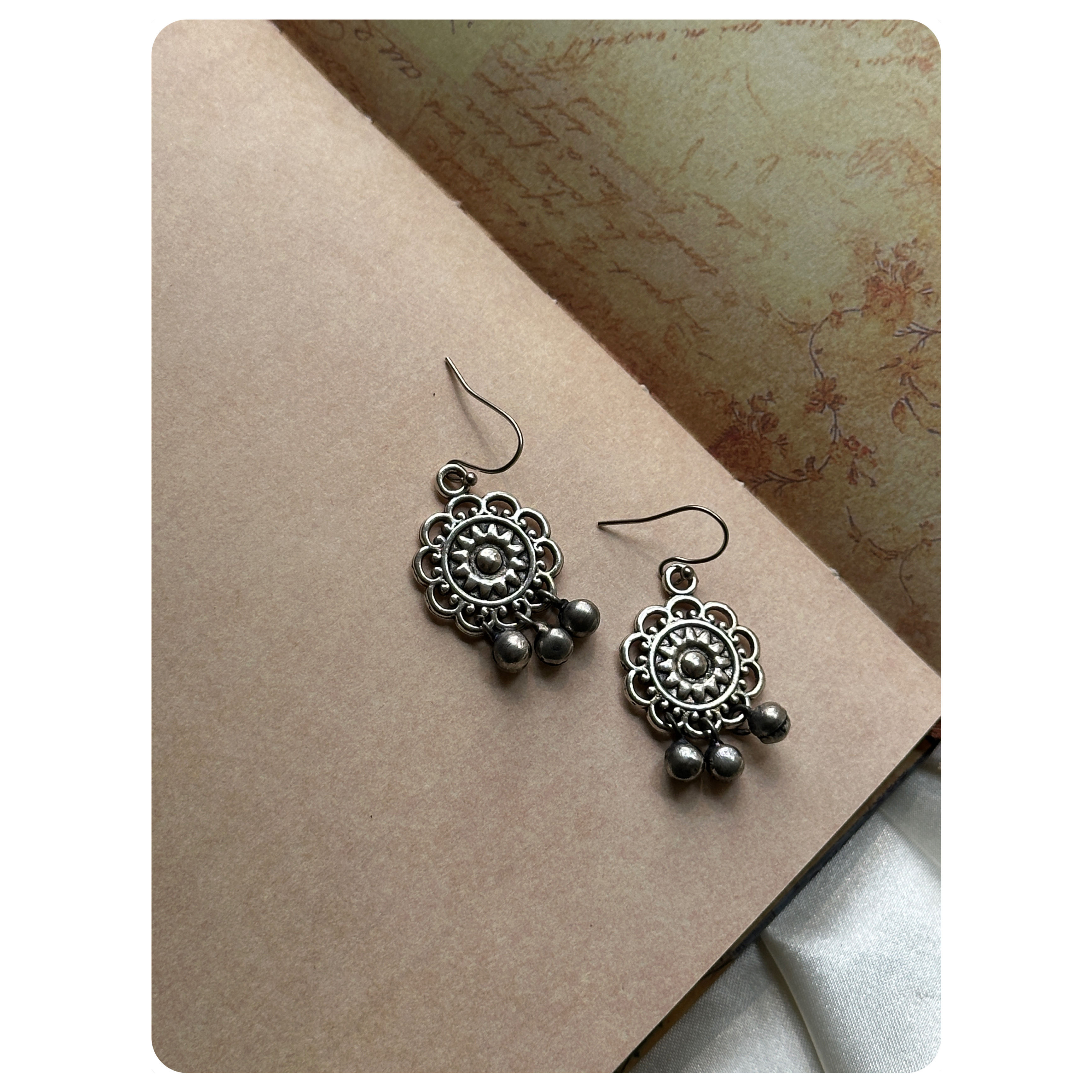 Silver Toned Floral Ghungroo Earrings 