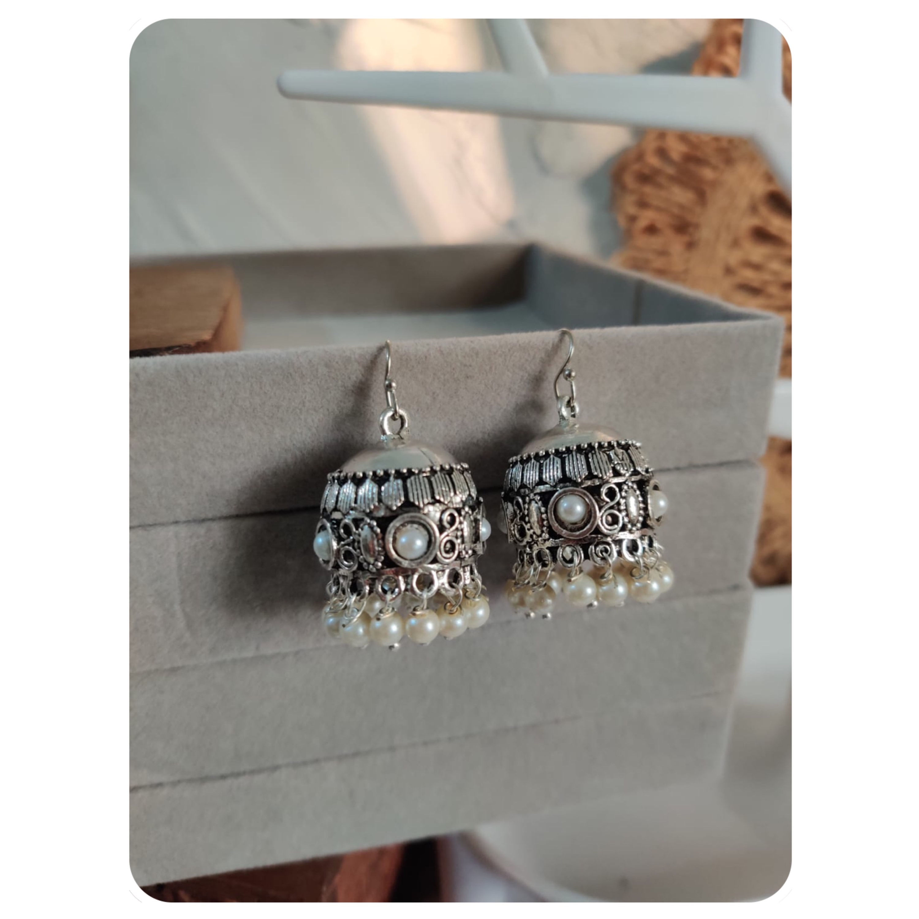 Silver Toned Pearl Embellished Jhumka