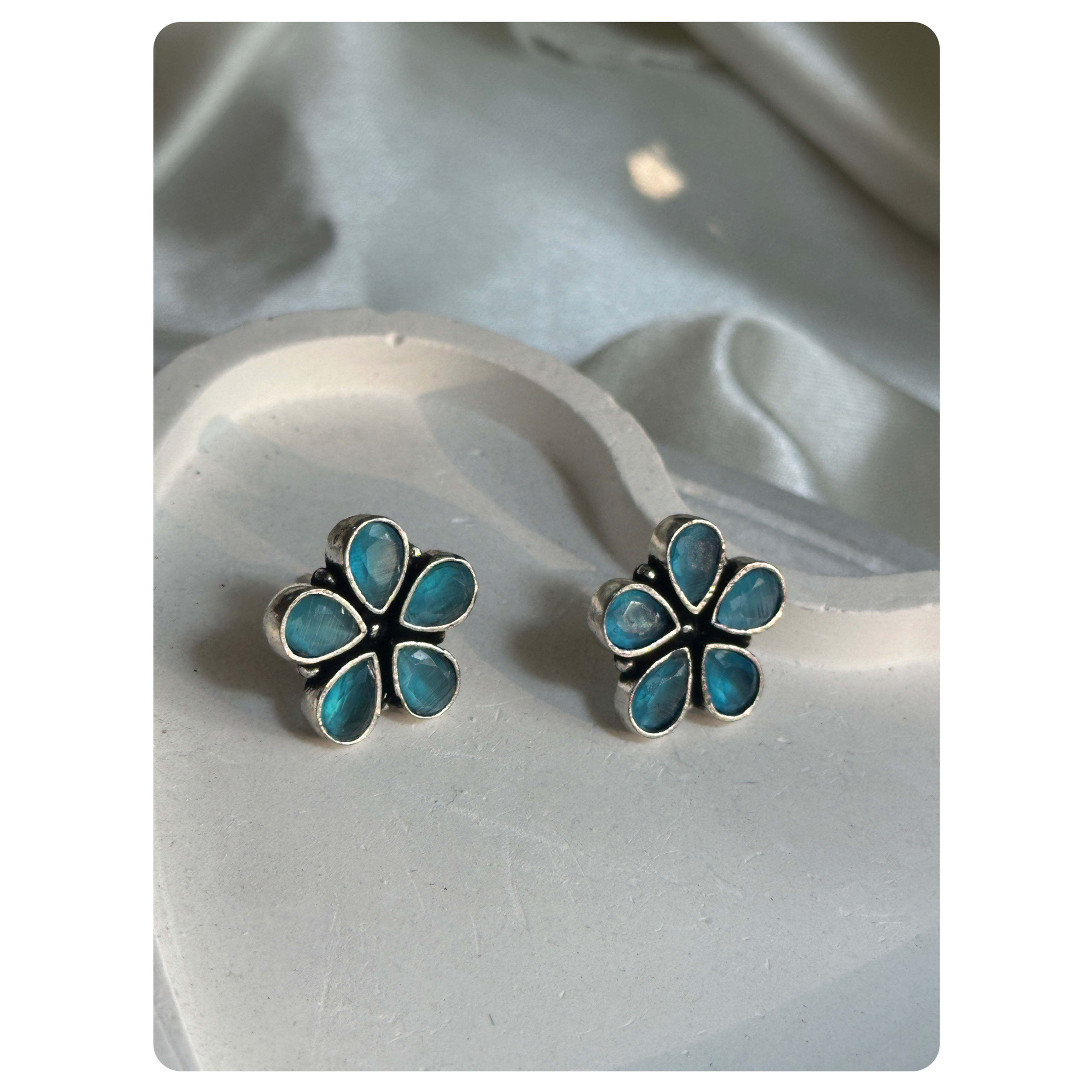 Silver Toned Blue Stone Floral Stud