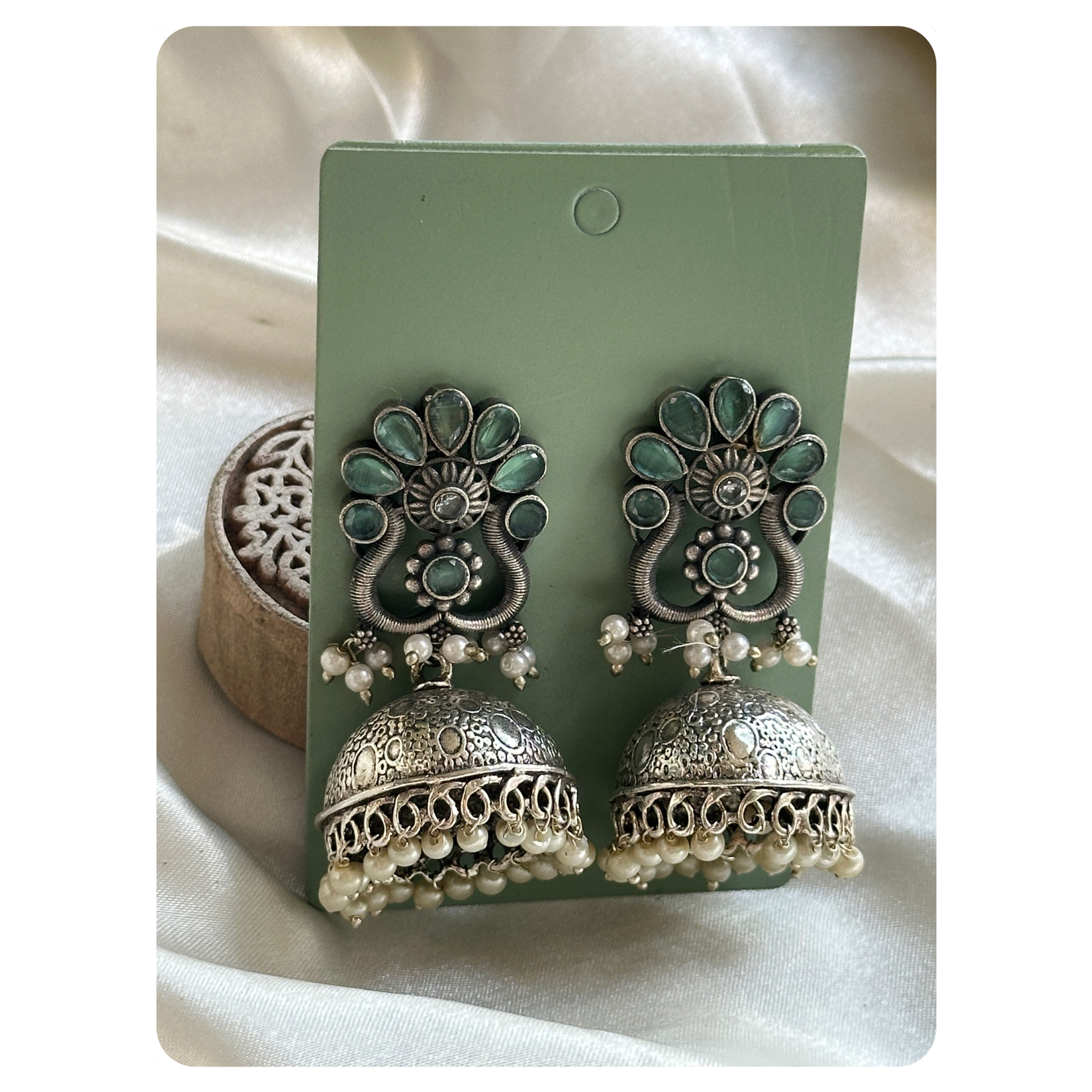 Silver Toned Mint Stone Dual Peacock Motif Stud Jhumkas