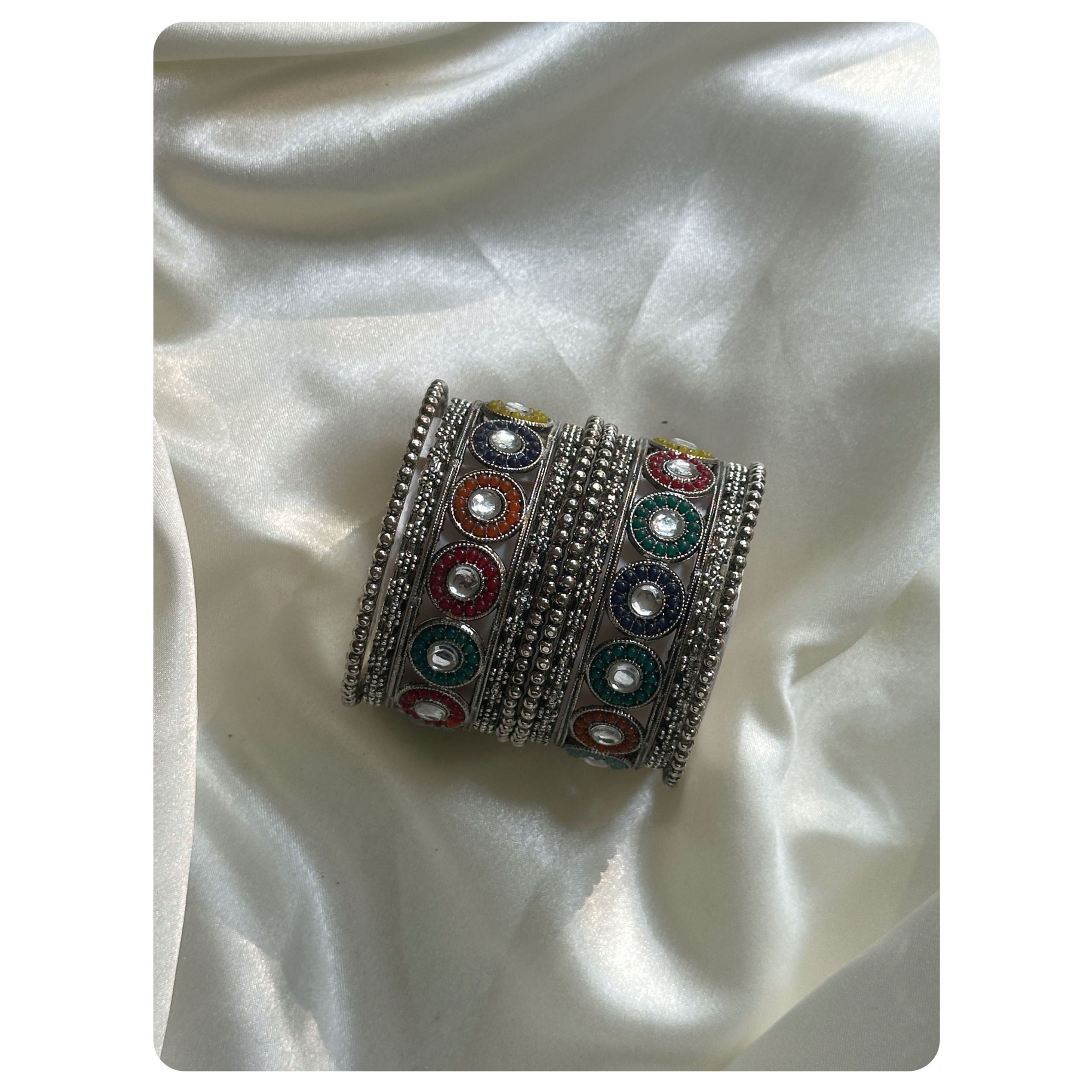 Silver Toned Multicolour Round Motif Bangle Set (10 pieces) Size- 2.8