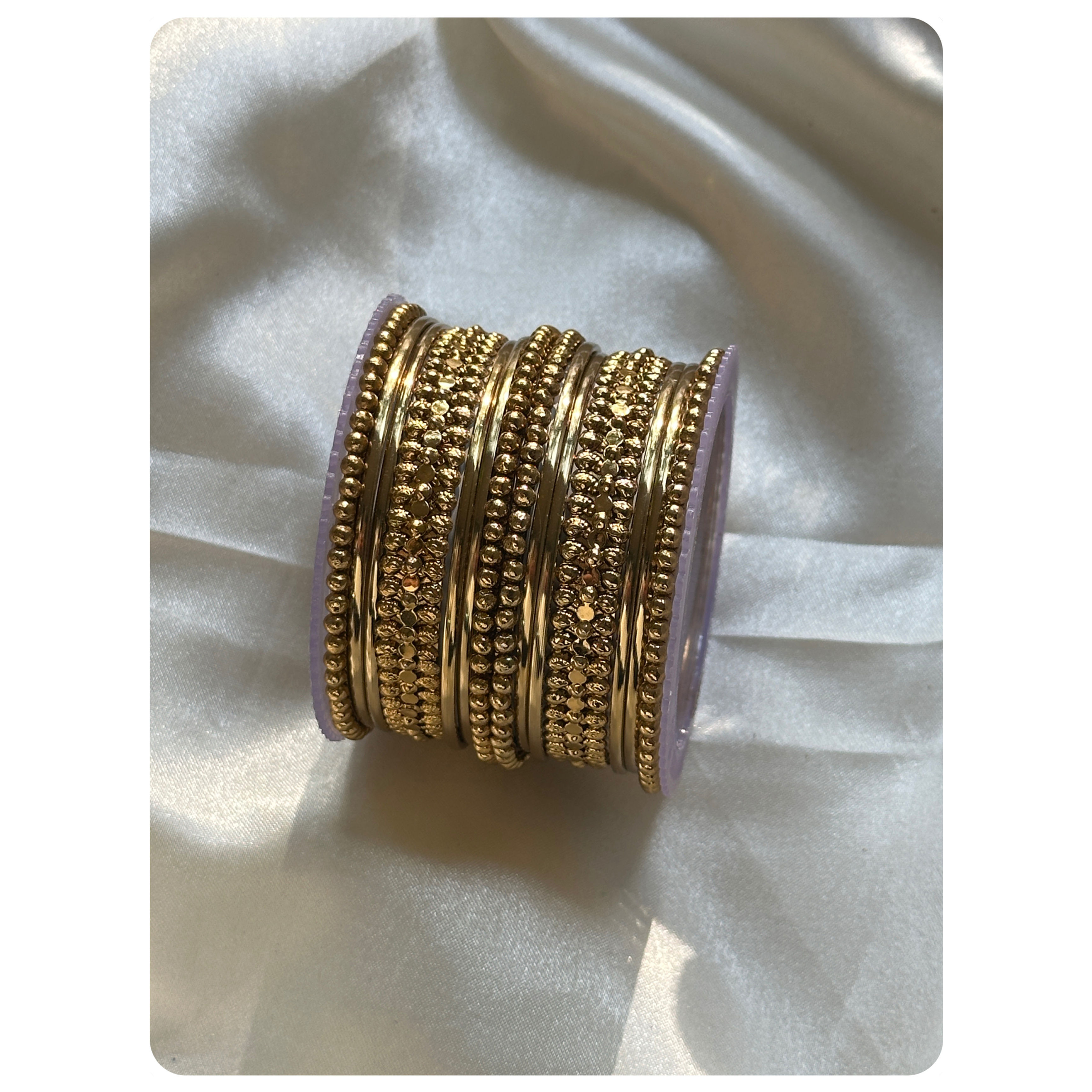 Gold Toned Plain and Beaded Bangle Set (18 pieces) Size- 2.8