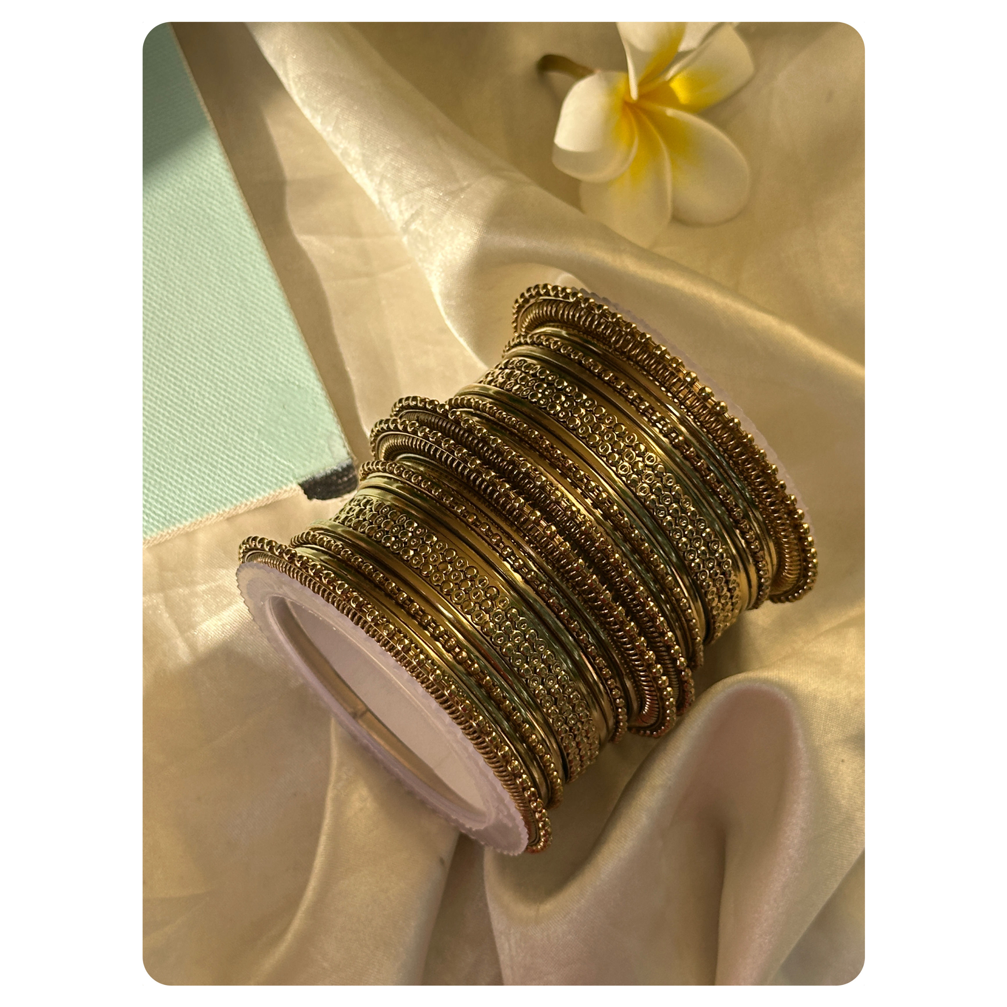 Gold Toned Mix Bangle Set (26 pieces) Size- 2.8