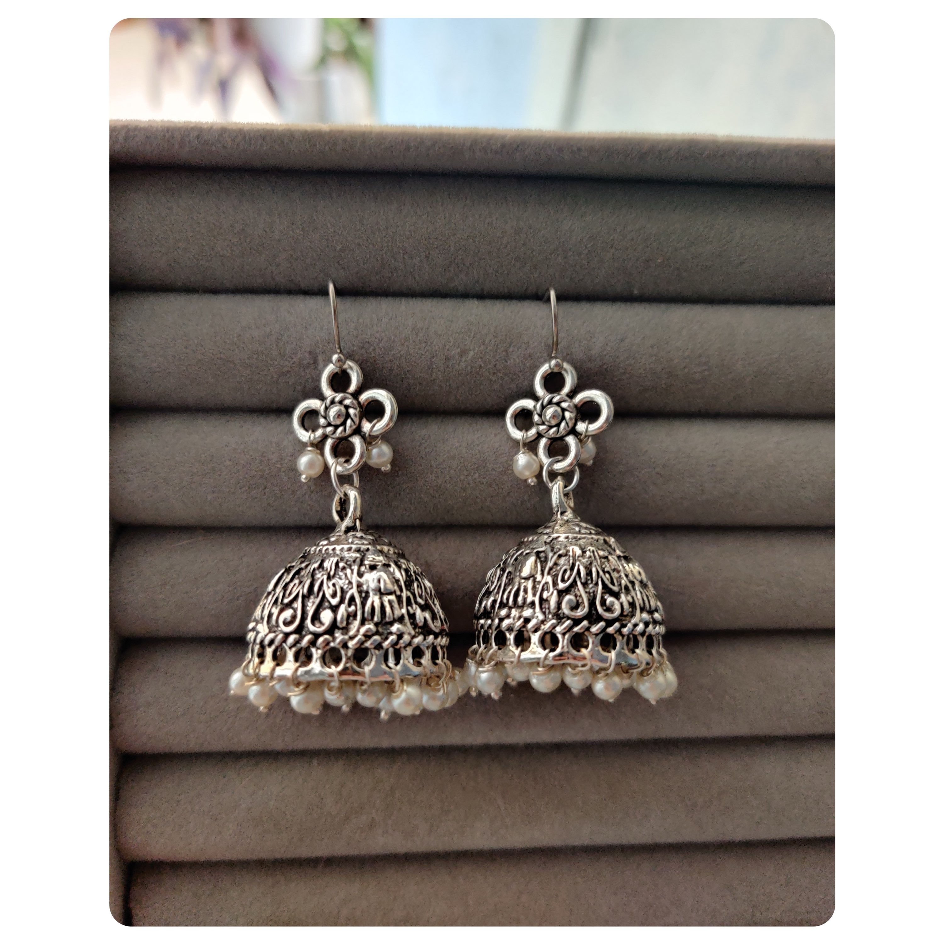 Silver Toned Floral Pearl Jhumkas