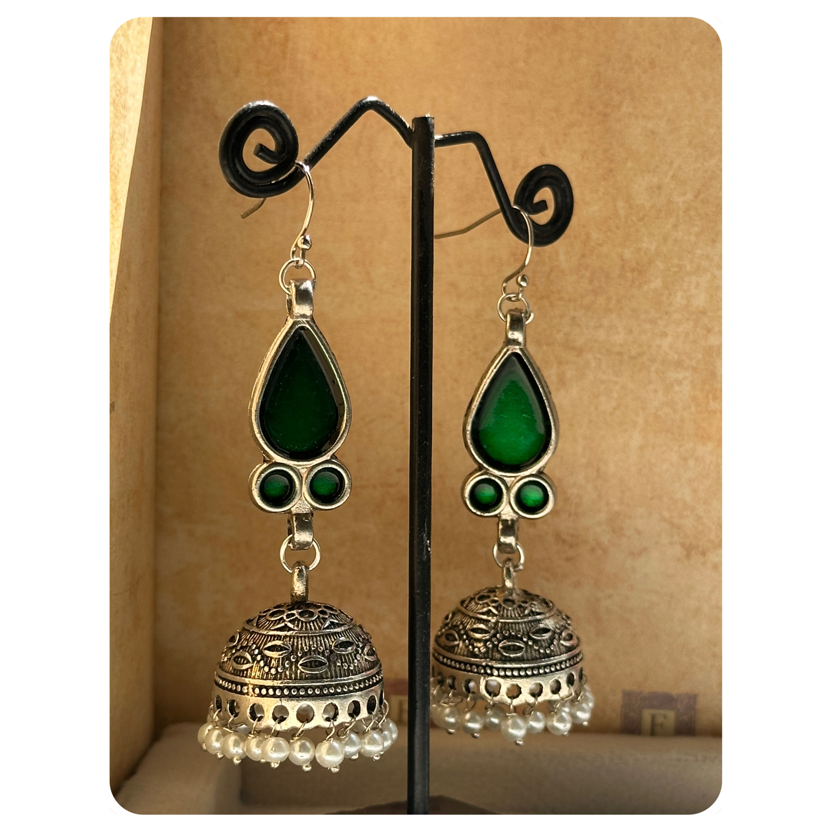 Silver Toned Green Enamelled Pearl Jhumkas