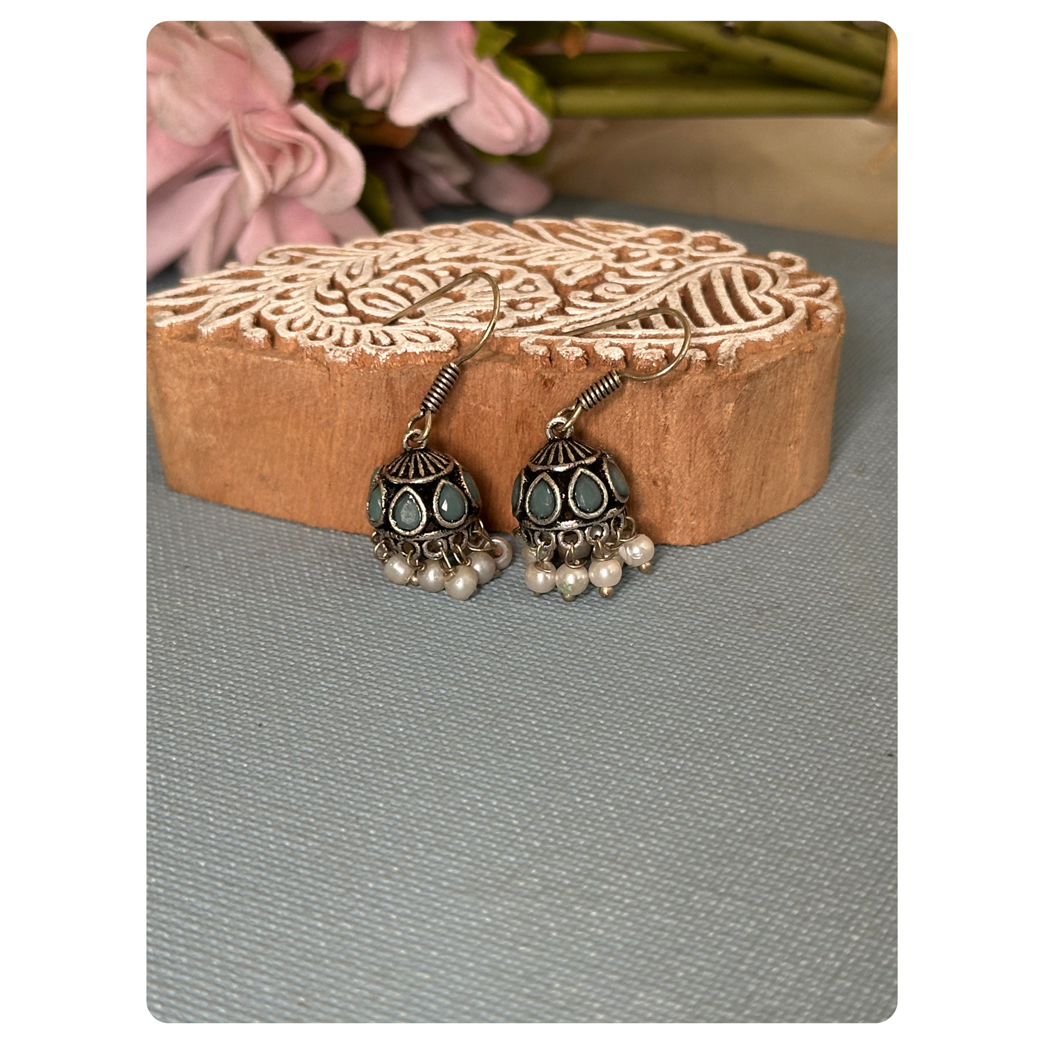 Silver Toned Aqua Blue Stone Embellished Jhumka