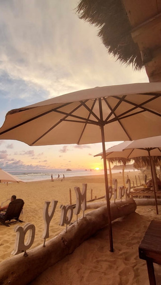 Zipolite cafe Maya Casa Acalli restaurant nude alquimista budamar oregano puesta del sol sunset