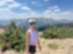 Lindsey Sparacino hiking in nature, embracing mindfulness, movement, and outdoor healing.