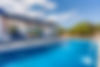 Pool with sun chairs
