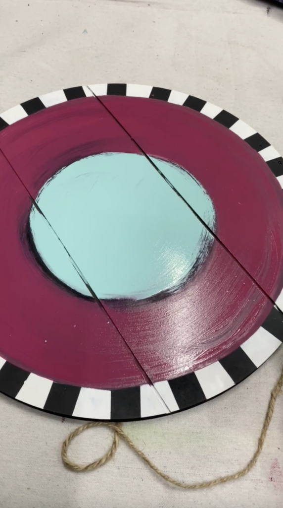 The gulf and plum crazy next to one another about to be blended by Tracey's Fancy for the background of her door hanger