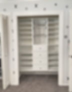 Modular closet organizational system with drawers, shelves, and hanging wire baskets