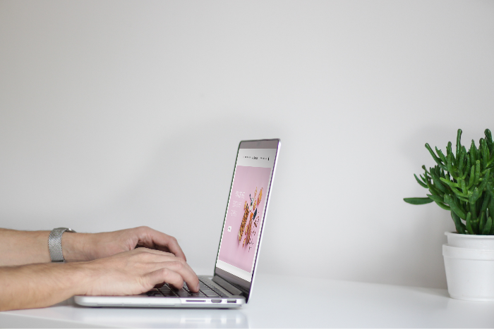 Working on the laptop - Digital marketing strategy and management services to increase brand visibility